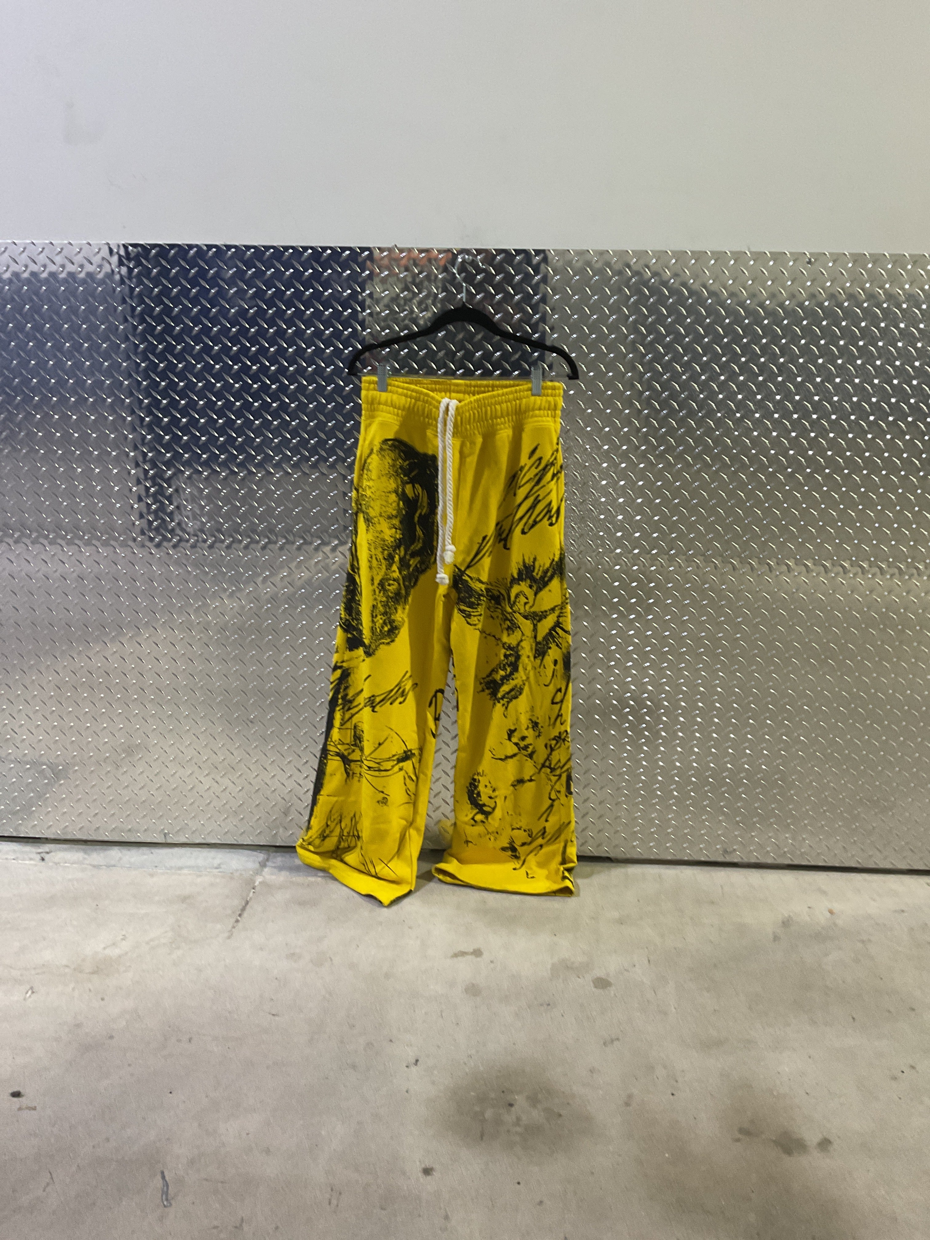 Yellow graffiti pants ￼